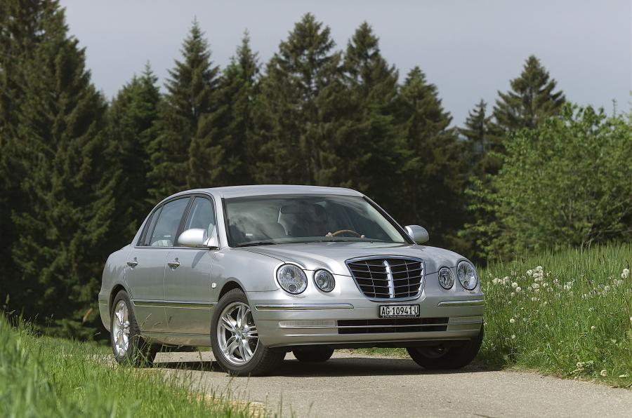  Kia Opirus 2003 года  (фото 40 из 54)